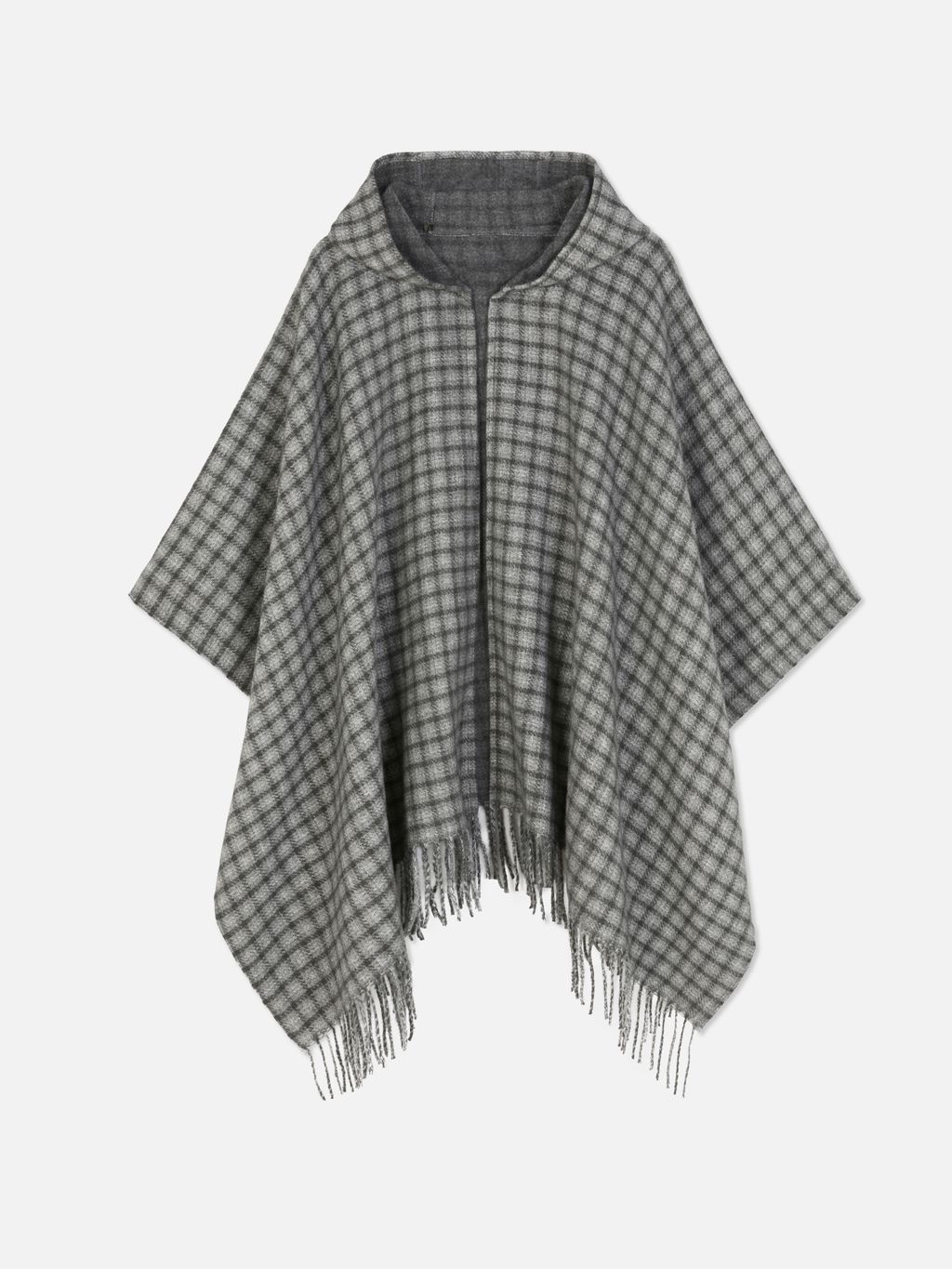 Poncho de cuadros de la colección de Paula Echevarría para Primark