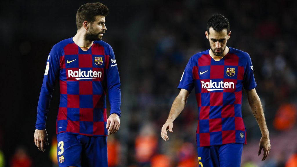 Gerard Piqué y Busquets, en un partido con el Barcelona.