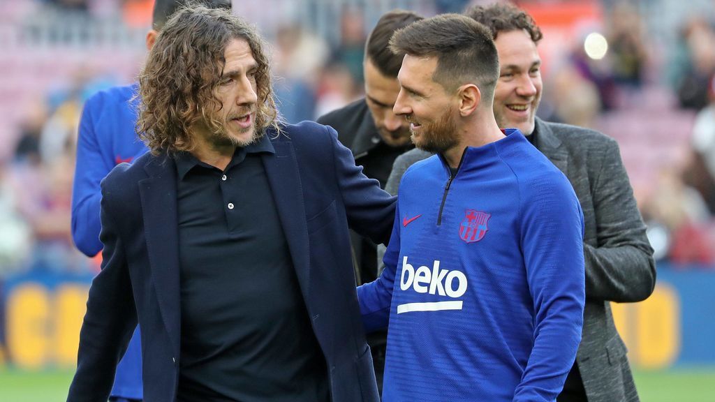 Carles Puyol y Leo Messi, en un acto en el Camp Nou antes de un partido.