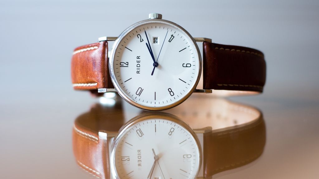 Reloj marcando la hora perfecta