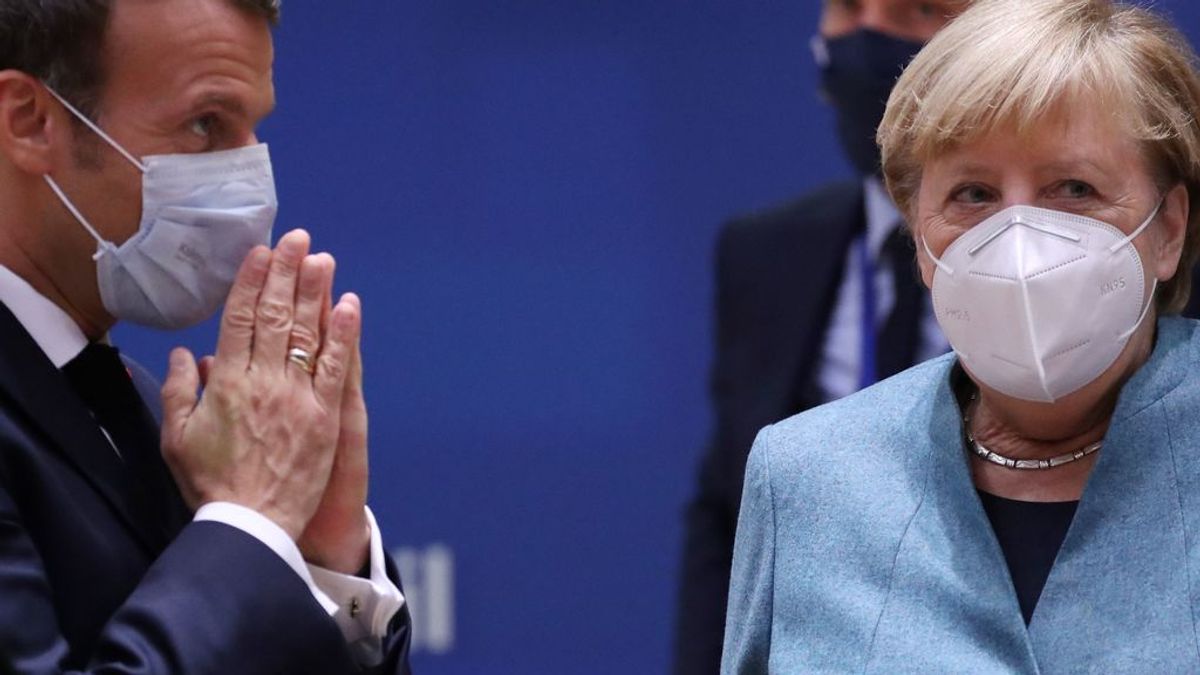 Macron y Merkel piden reforzar la frontera de la UE y endurecer el asilo para hacer frente al terrorismo Macron y Merkel piden reforzar la frontera de la UE y endurecer el asilo para hacer frente al terrorismo