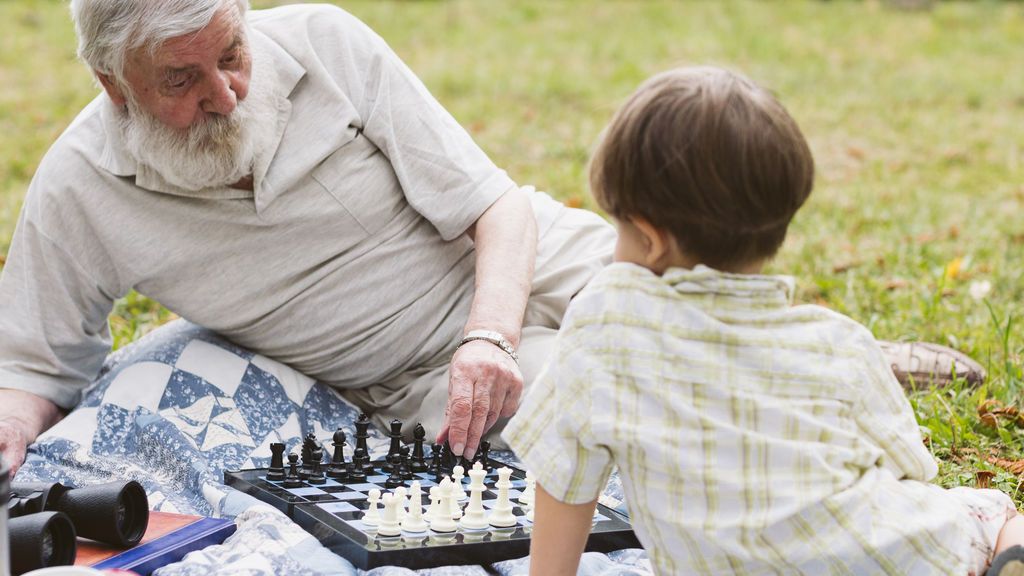 grandpa-teaching-grandson-chess