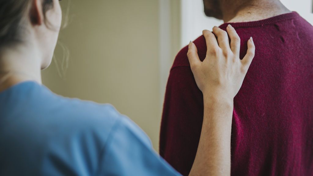 female-nurse-touching-patients-shoulder