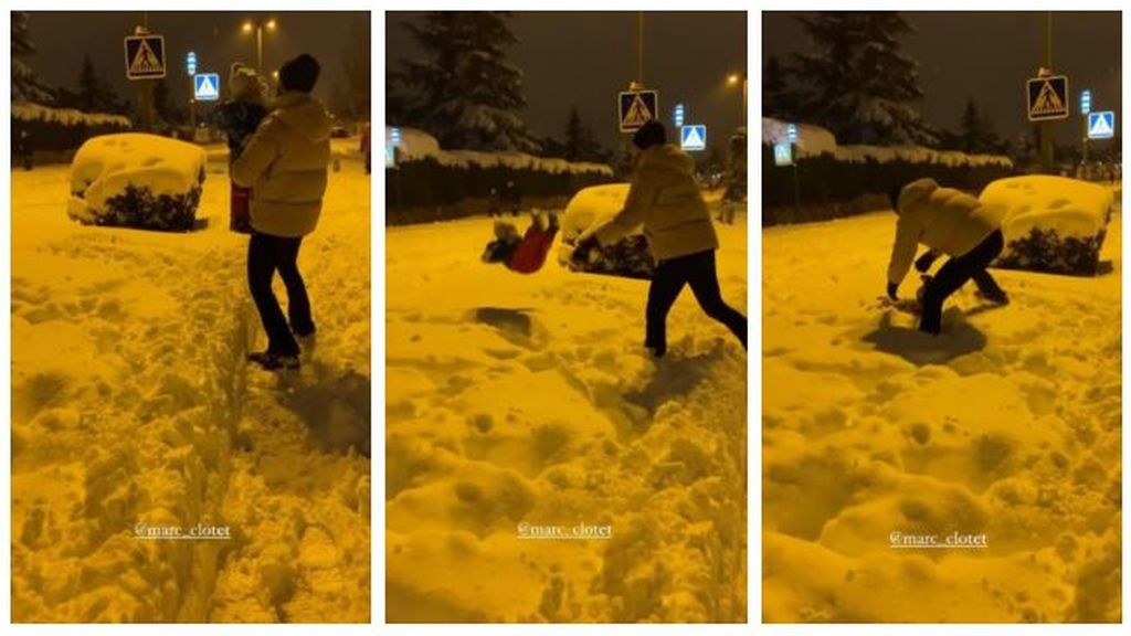 Marc tirando a su hija en la nieve