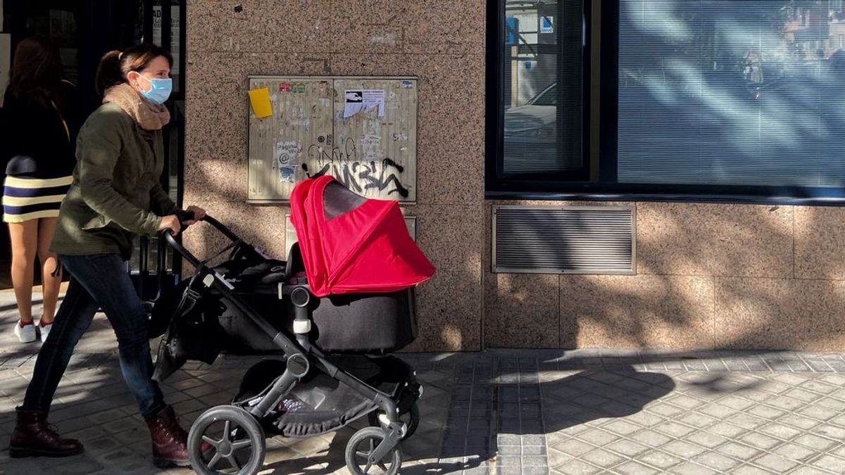 Mujer con hijos Mujer con hijos