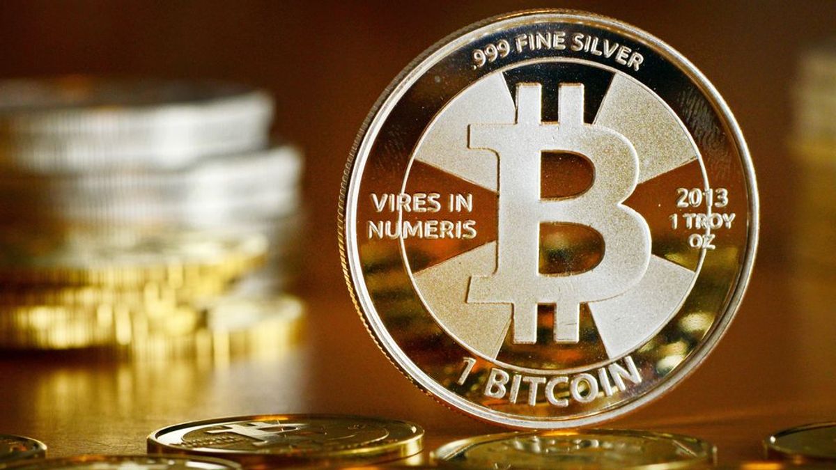 El bitcoin marca un nuevo récord al alcanzar los 60.000 dólares El bitcoin marca un nuevo récord al alcanzar los 60.000 dólares