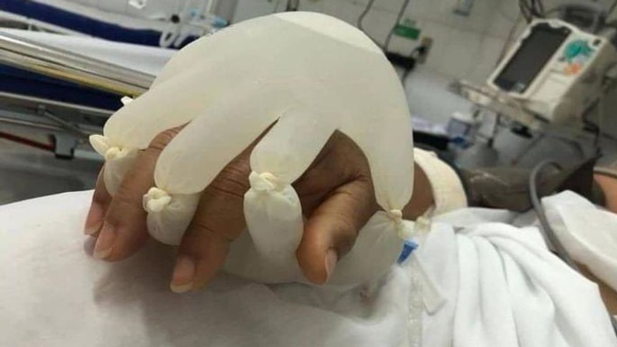 'La mano de Dios', el método de una enfermera para reconfortar a los pacientes aislados por covid