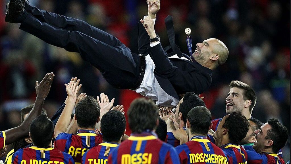 Guardiola celebrando la Champions 2011 con sus jugadores