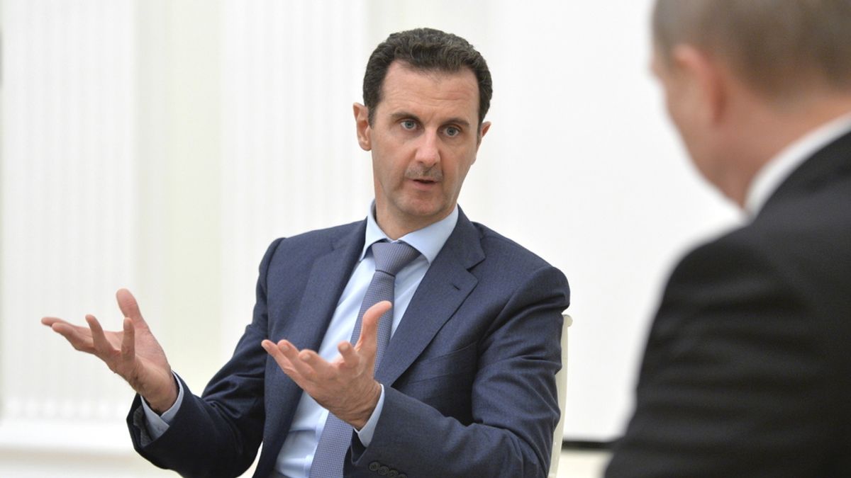 Al Assad durante un encuentro con Putin