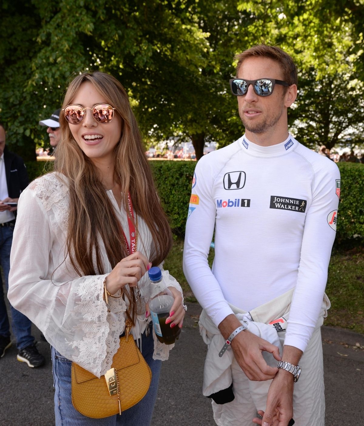 Jenson Button y Jessica Michibata