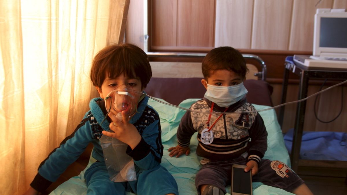 Niños afectados por una atque en Irak