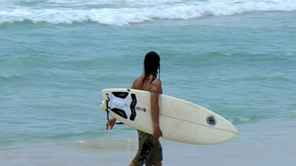 Sol, playa y olas en Miami