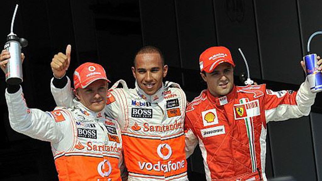 Hamilton, Kovalainen y Massa saludan tras la clasificación