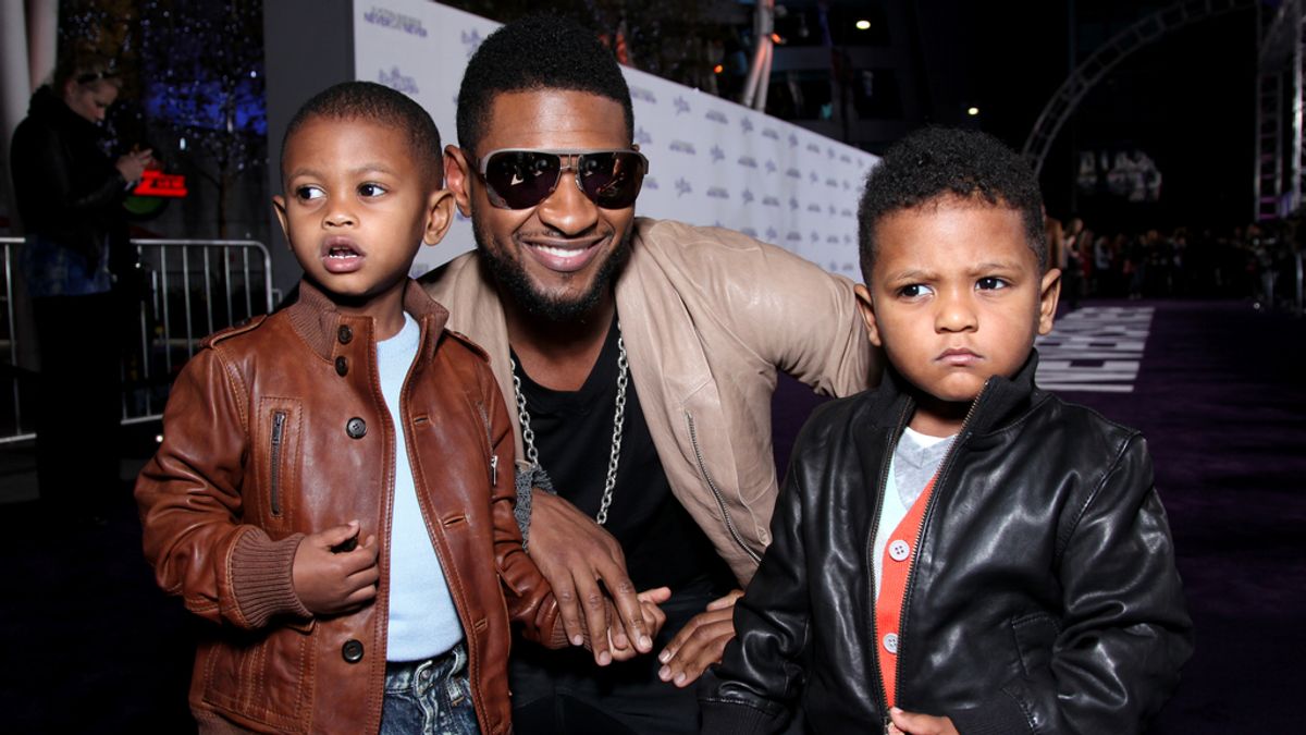 Usher con sus hijos