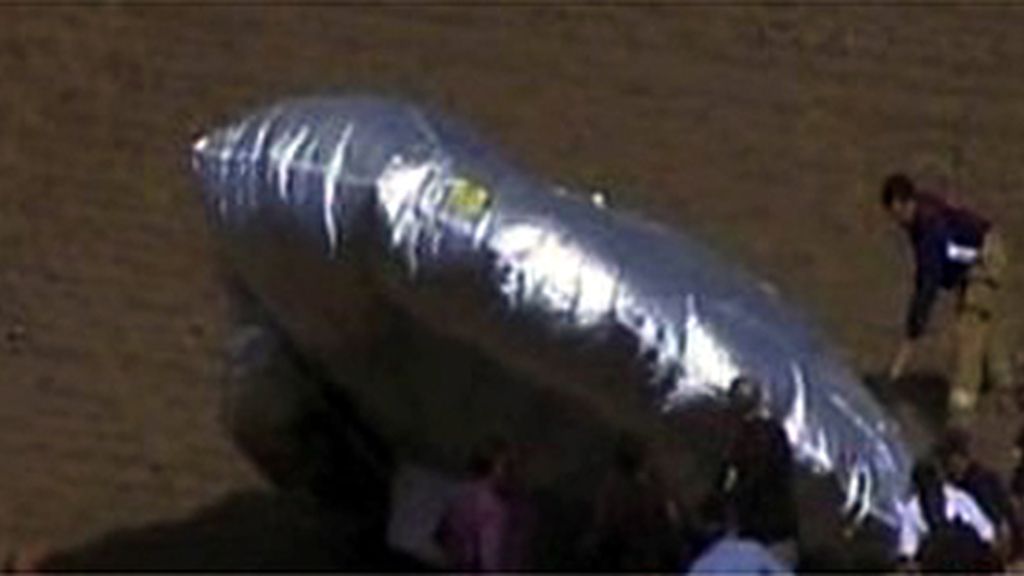 El globo al llegar al suelo El globo al llegar al suelo
