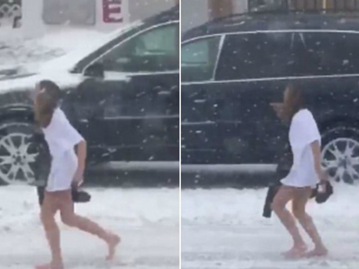 Qué hace esta chica medio desnuda en plena tormenta de nieve?