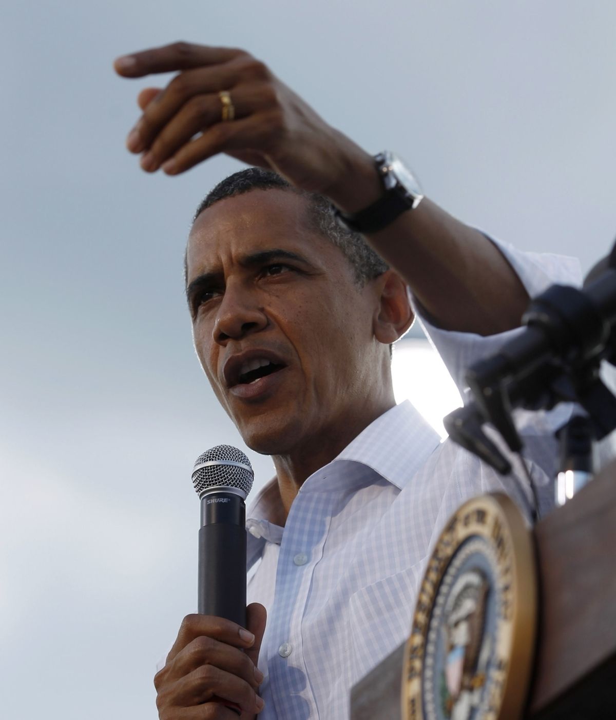 Obama habla en público en Alpha, Illinois.