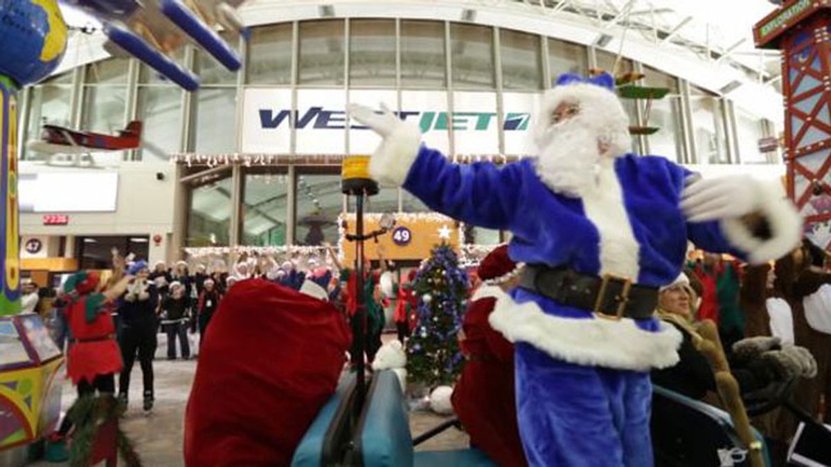 Una aerolínea canadiense sorprende a sus pasajeros concediéndoles sus deseos de Navidad