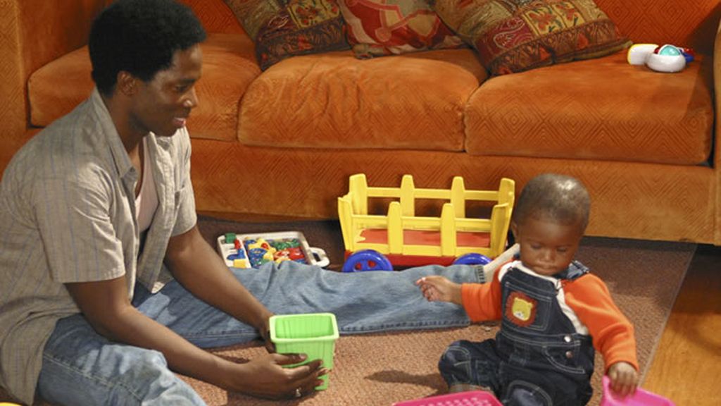 Michael juega con su hijo pequeño , Walt