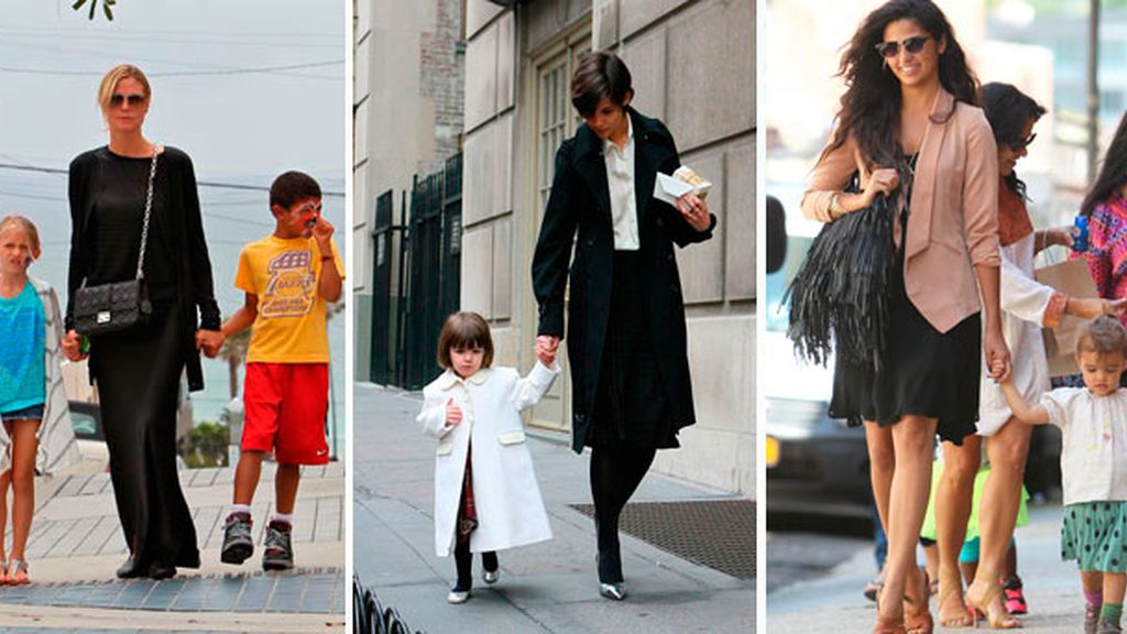 Taconazo, gafa oscura  y… ¡con el niño a cuestas!