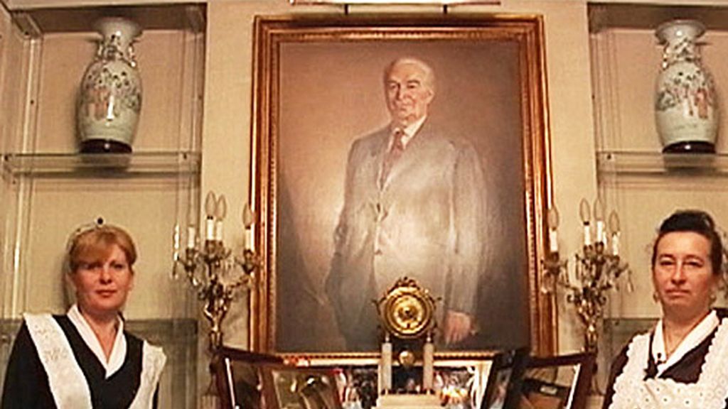 Posando junto al jefe