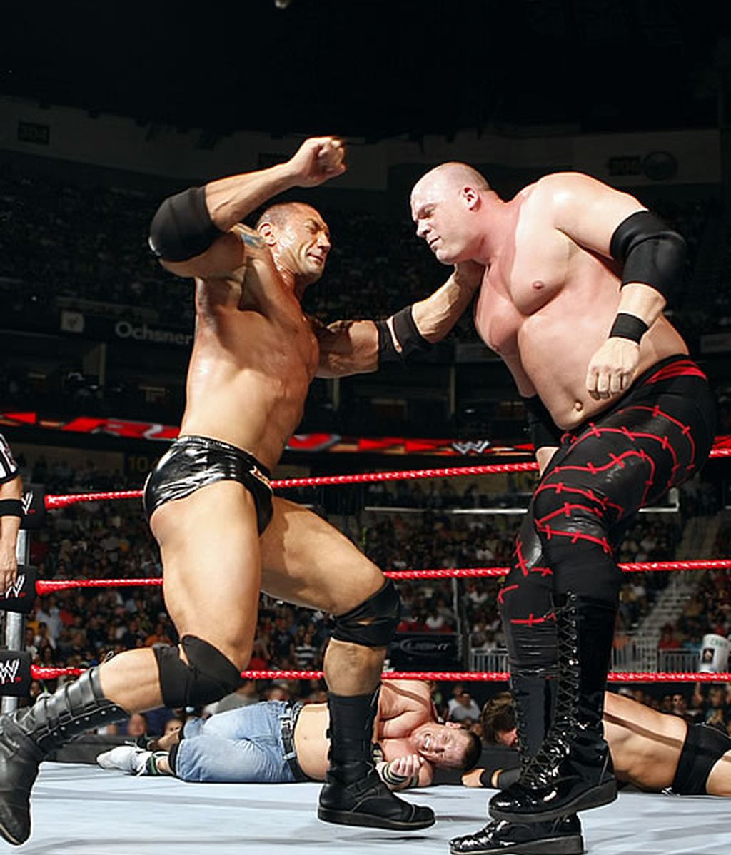 Batista y Kane en combate