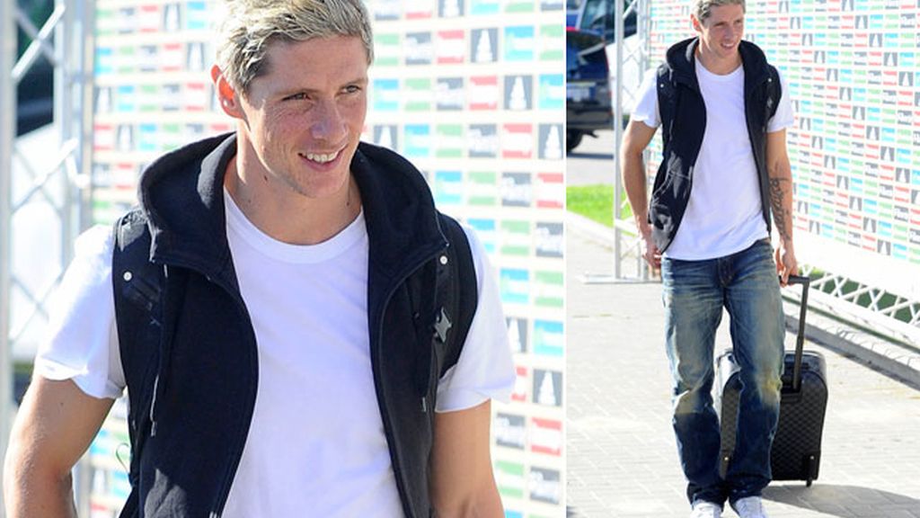 Torres, de camiseta blanca y chaleco