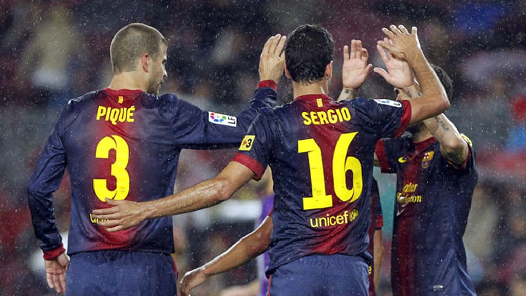 Tito y Abidal levantan la Liga