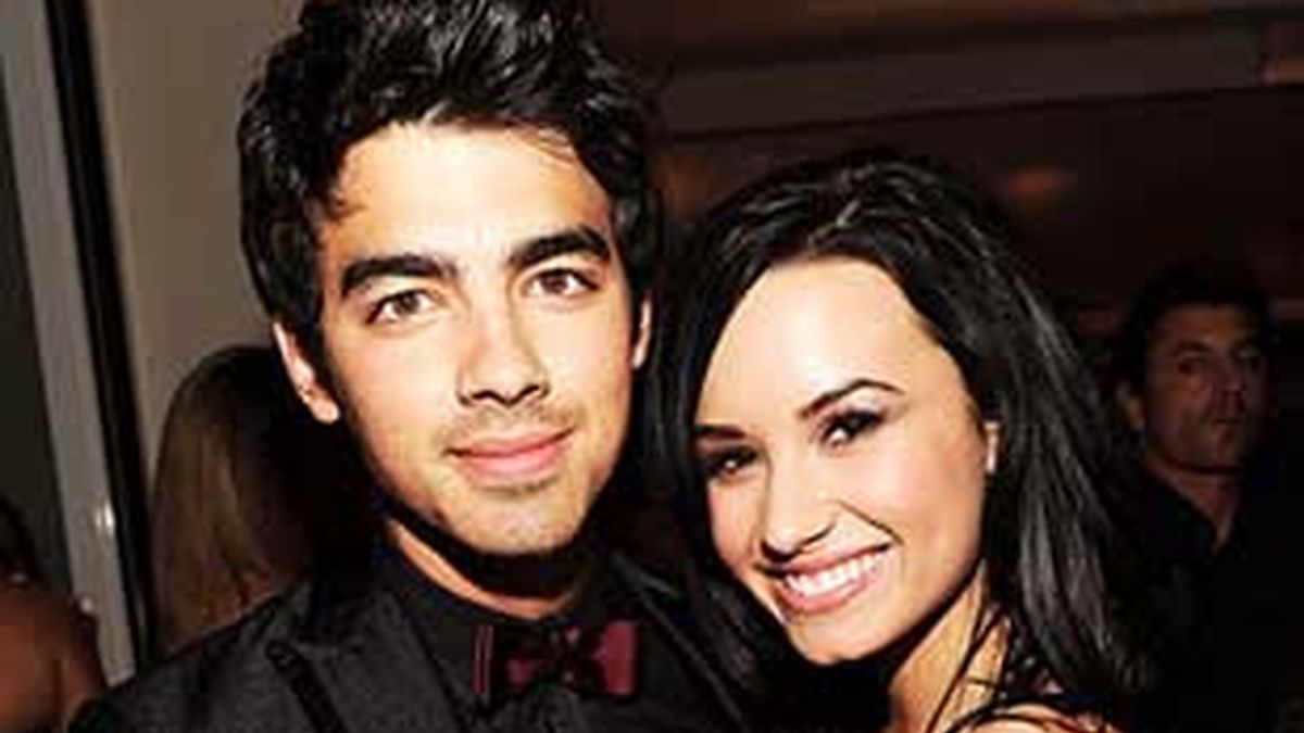 Joe Jonas y Demi Lovato durante la fiesta posterior a la última ceremonia de los Oscar, momento en el que se hacía pública su relación.