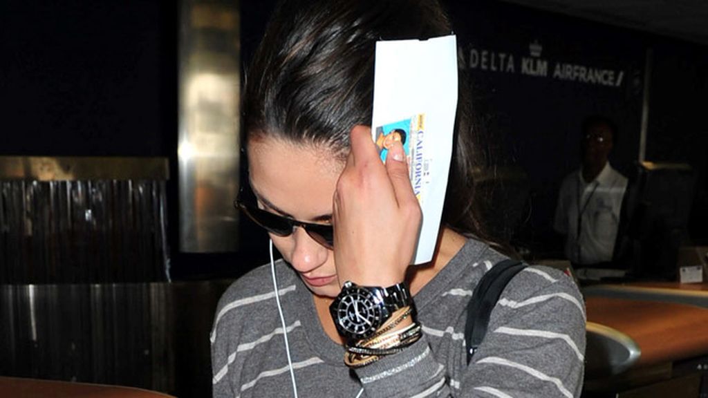 Mila Kunis y Ashton Kutcher, de profesión: taparse la cara