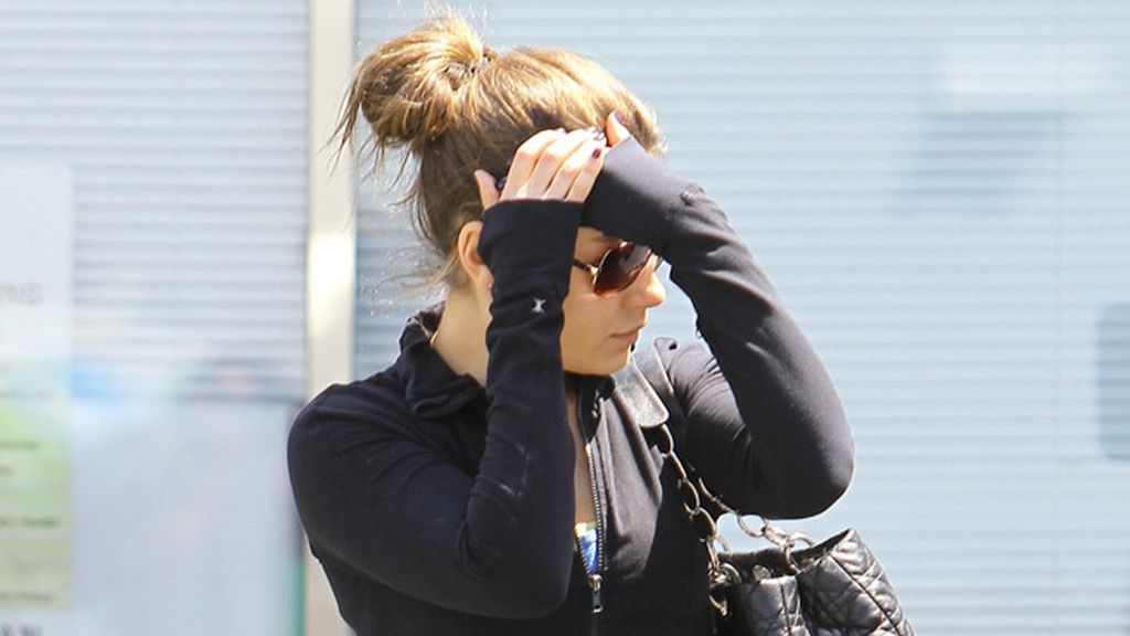 Mila Kunis y Ashton Kutcher, de profesión: taparse la cara