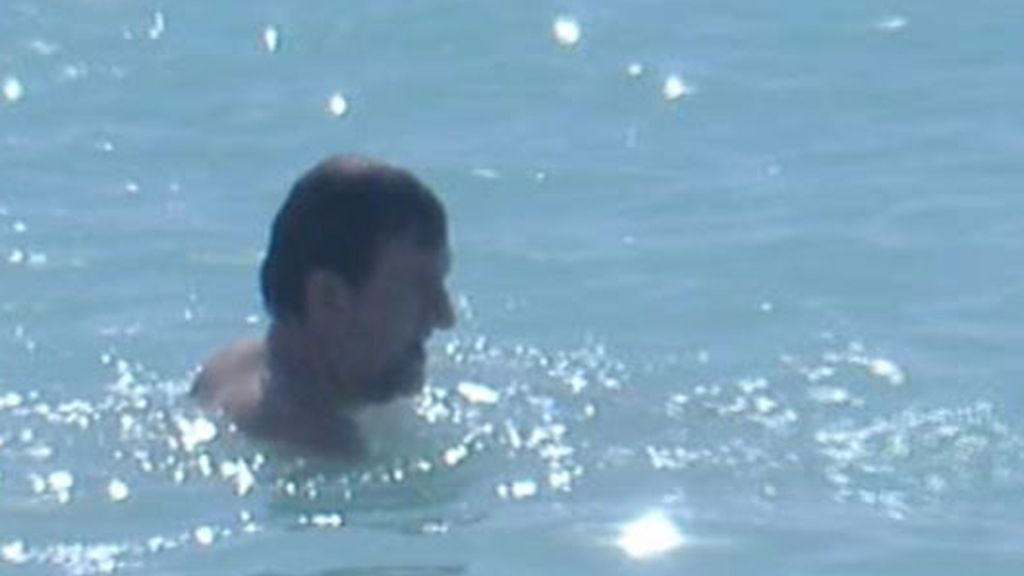 Rajoy luce palmito en la playa