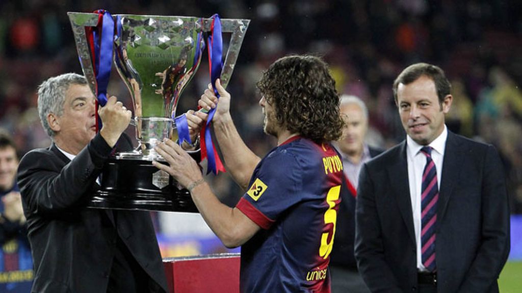 Tito y Abidal levantan la Liga
