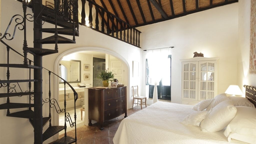 Once habitaciones deluxe y tres casitas decoradas por Kuky Mora-Figueroa