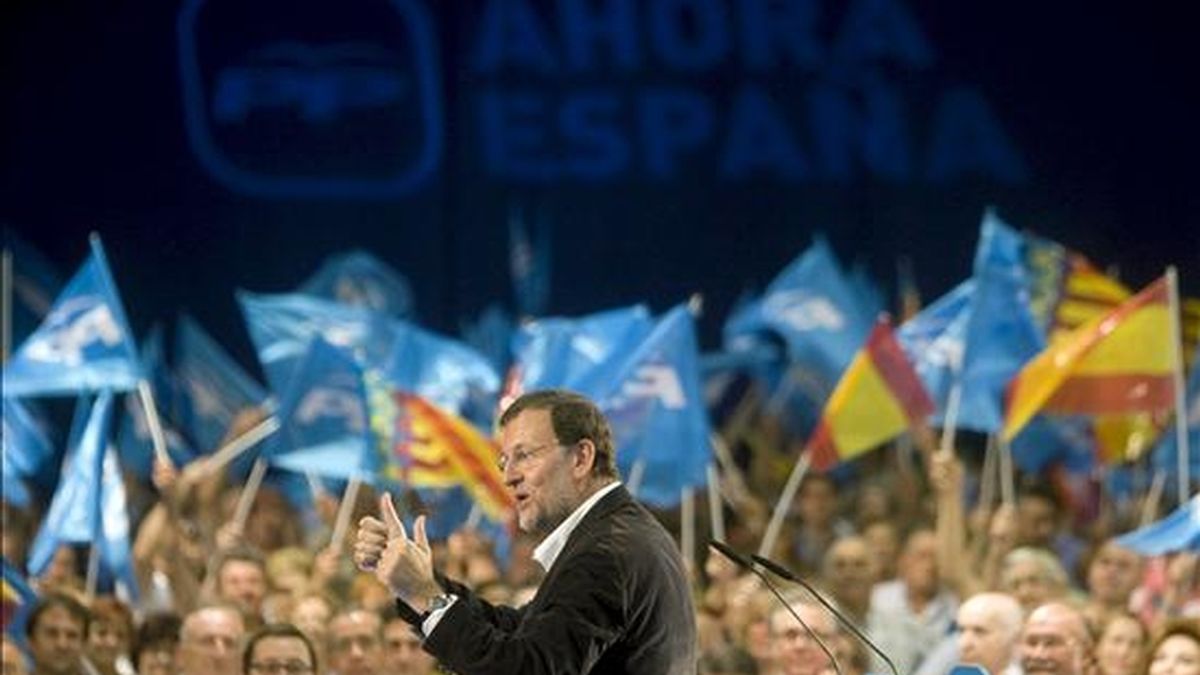 El presidente del PP, Mariano Rajoy, durante su intervención en el acto de celebración en Valencia del primer aniversario del último congreso nacional del partido, que tuvo lugar en esta ciudad. EFE