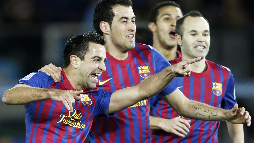 Xavi y Busquets durante un partido de Liga Xavi y Busquets durante un partido de Liga