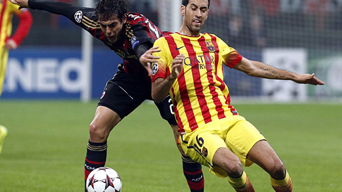 Kaká y Busquets Kaká y Busquets