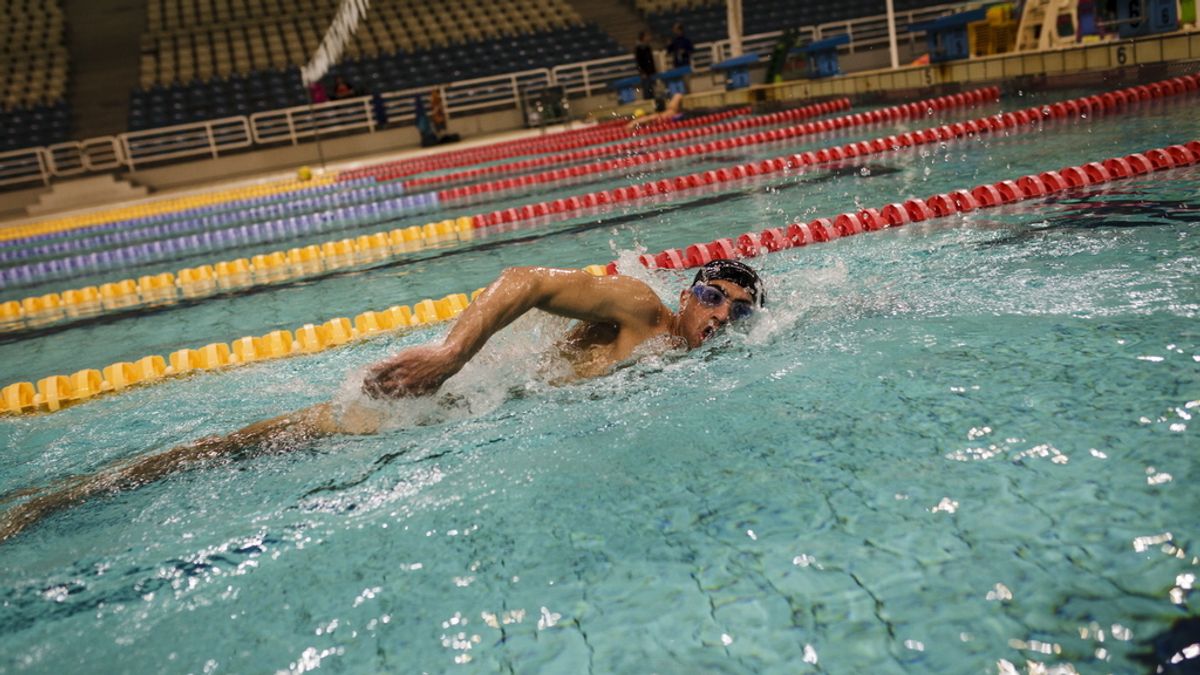 Un nadador amputado de Siria portará la antorcha olímpica en un centro de refugiados de Atenas