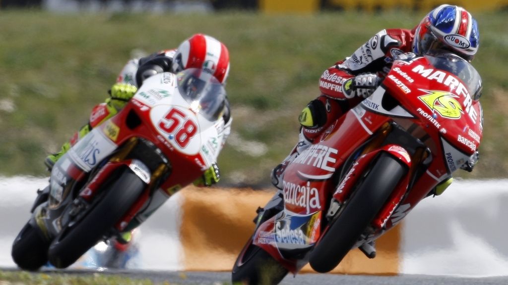 Mano a mano entre Simoncelli y Bautista en el GP Portugal (Año 2008)