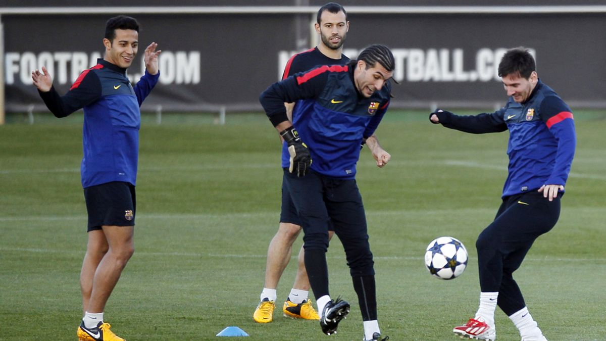 Lionel Messi, Pinto, Thiago Alcantara y Javier Mascherano en el entrenamiento previo al partido de Champions ante el Milan