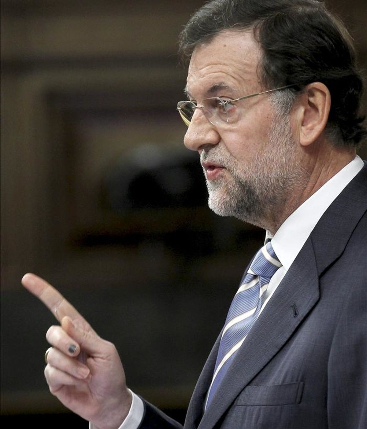 El líder del PP, Mariano Rajoy, durante su intervención hoy ante el pleno del Congreso en el debate sobre las conclusiones de la Cumbre europea de la semana pasada. EFE