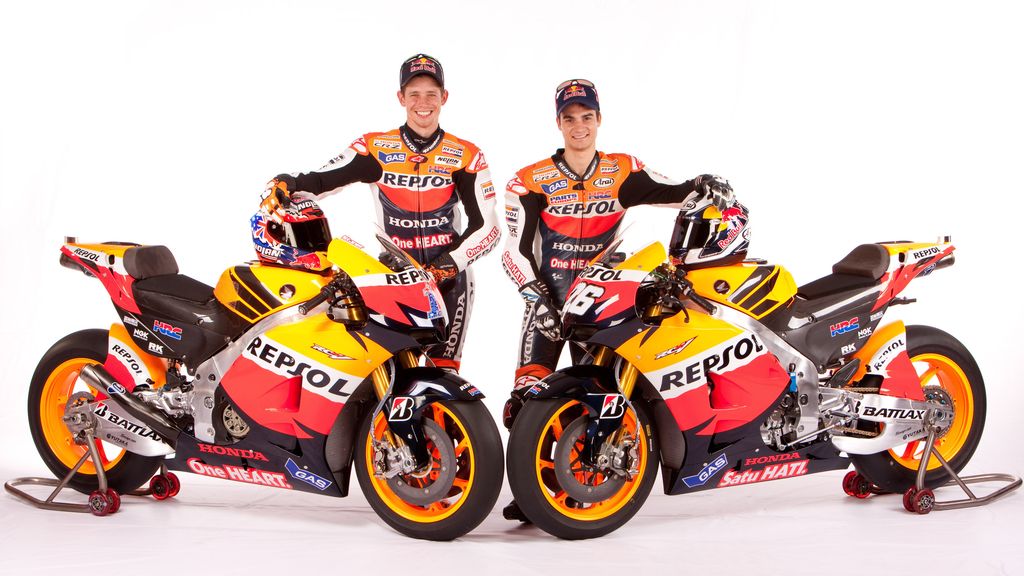 Dani Pedrosa y Casey Stoner posan con la Honda