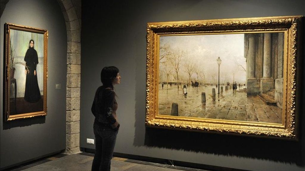 Una muejr ante las obras "El Pla de Palau" (1887) de Modest Teixidor (d) y "Melanconia" (1893) de Santiago Rusiñol (i), que se exhiben a partir de esta mañana en la nueva sede de CaixaForum Girona después de la absorción de Caixa Girona por parte de La Caixa, en la muestra inédita titulada 'La febre d'or. Escenes de la nova burgesía', que reúne un conjunto de obras del siglo XIX en la que los burgueses de la época son los protagonistas y que ilustra el ascenso de esta clase social. EFE Una muejr ante las obras "El Pla de Palau" (1887) de Modest Teixidor (d) y "Melanconia" (1893) de Santiago Rusiñol (i), que se exhiben a partir de esta mañana en la nueva sede de CaixaForum Girona después de la absorción de Caixa Girona por parte de La Caixa, en la muestra inédita titulada 'La febre d'or. Escenes de la nova burgesía', que reúne un conjunto de obras del siglo XIX en la que los burgueses de la época son los protagonistas y que ilustra el ascenso de esta clase social. EFE