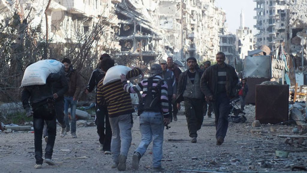 Los sirios huyen de la ratoneta de Homs