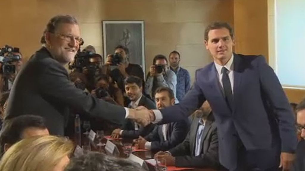 Pacto "satisfactorio" de PP y Ciudadanos para investir a Rajoy