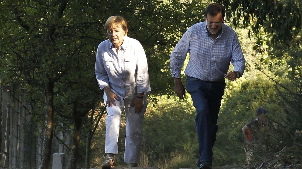 Merkel y Rajoy, dos peregrinos en Santiago