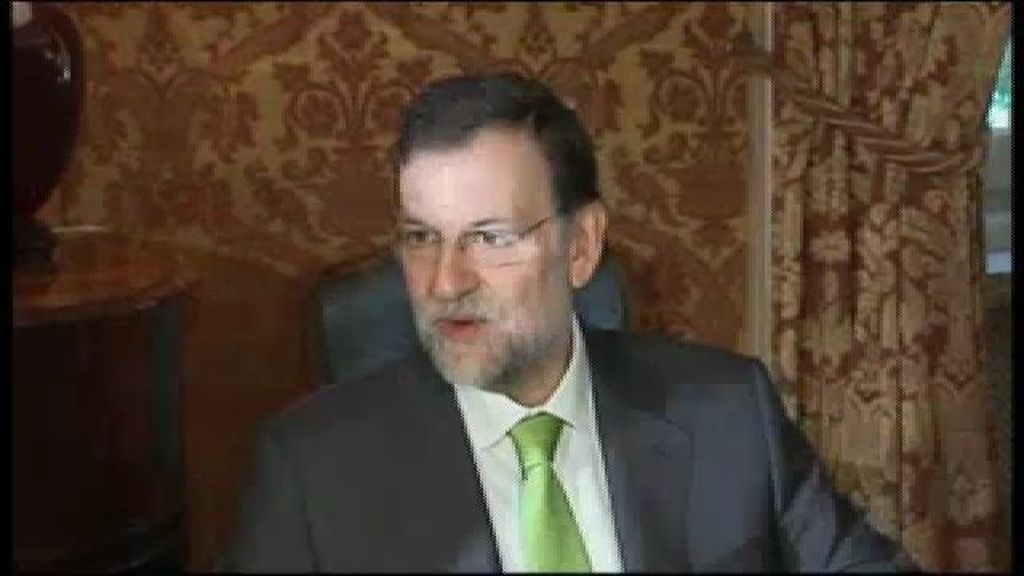 Rajoy, sonriente
