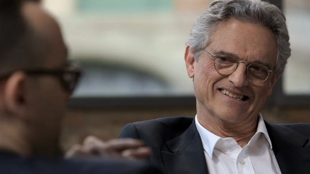 El psiquiatra charla con el publicista