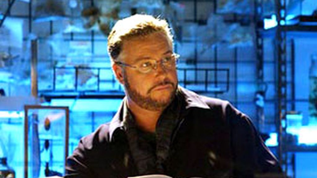 Gil Grissom en el laboratorio forense.