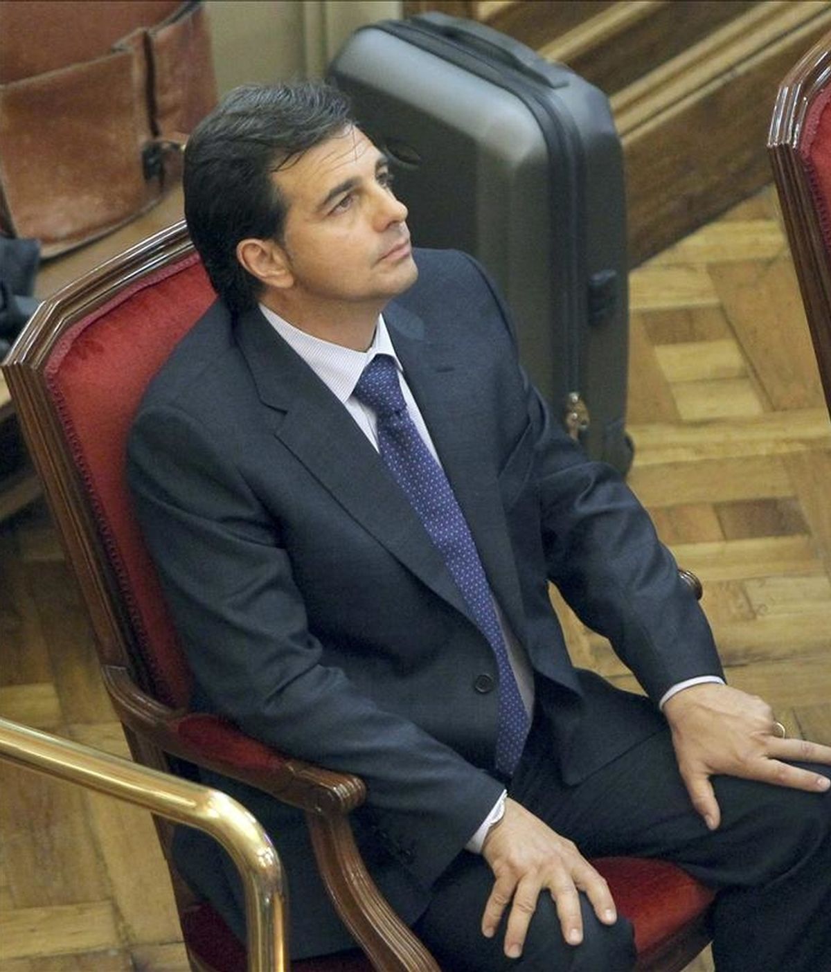 El yerno y jefe de seguridad de los joyeros Tous, Lluís Corominas, acusado de matar a un presunto ladrón, en la silla de los acusados de la Audiencia de Barcelona. EFE